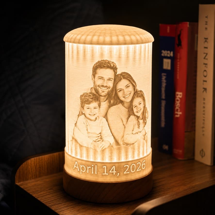 A custom photo lamp designed and built by BakaroArt glowing on a shelf.